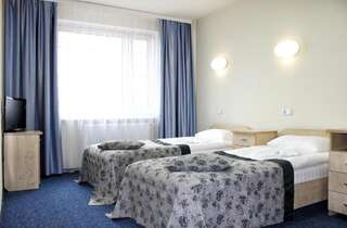 Отель East Time Hotel Минск Стандартный трехместный номер-1
